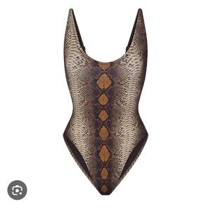 SKIMS LIMITED EDITION: DESERT SNAKE PRINT

Size L
desert-snake-print